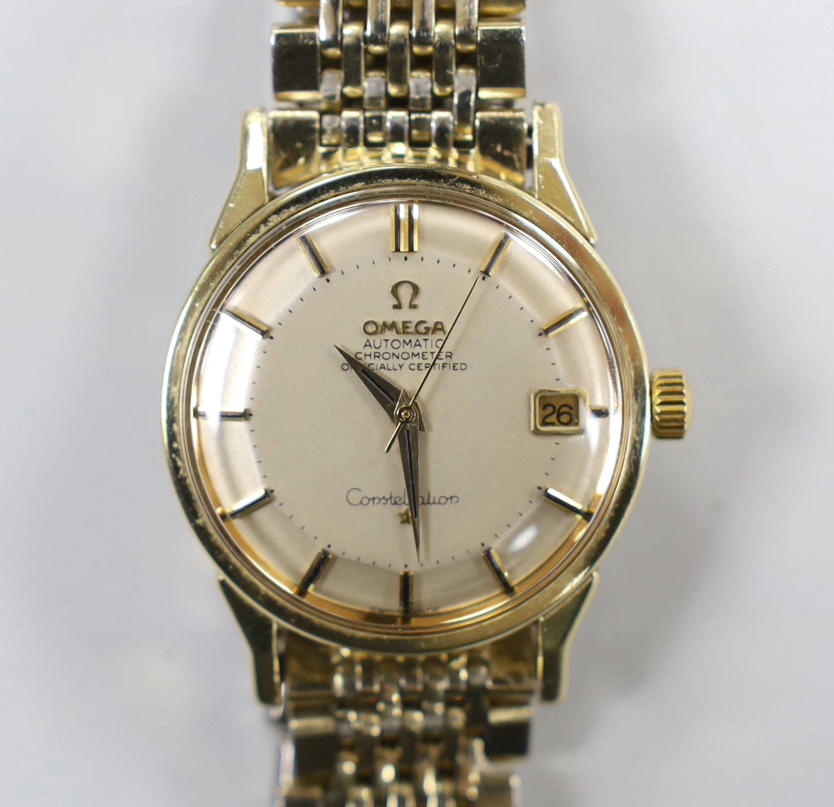 A gentleman's 1960's? steel and gold plated Omega Constellation Automatic Chronometer 'pie-pan' dial wrist watch, on steel and gold plated Omega bracelet, case diameter 35mm.